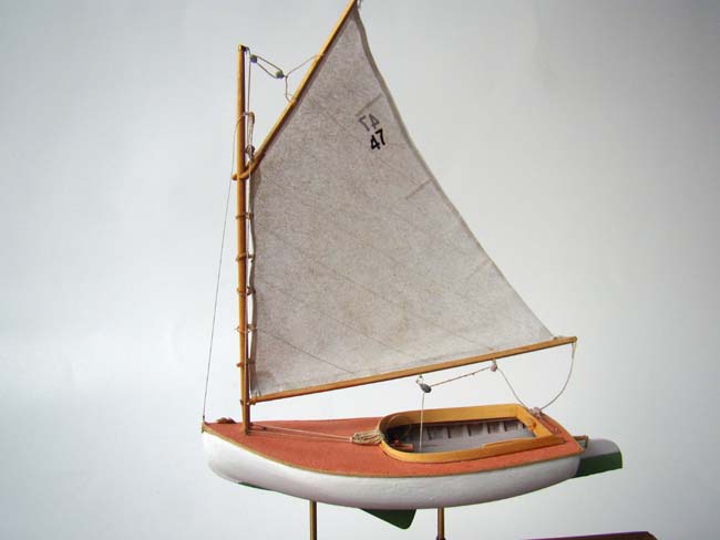 An exceptionally fine scratch built model of a circa 1921 Beetle Catboat in 1:48 scale
